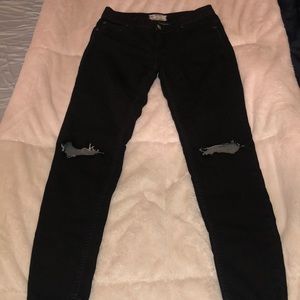 Black free people jeans, ripped at the knee